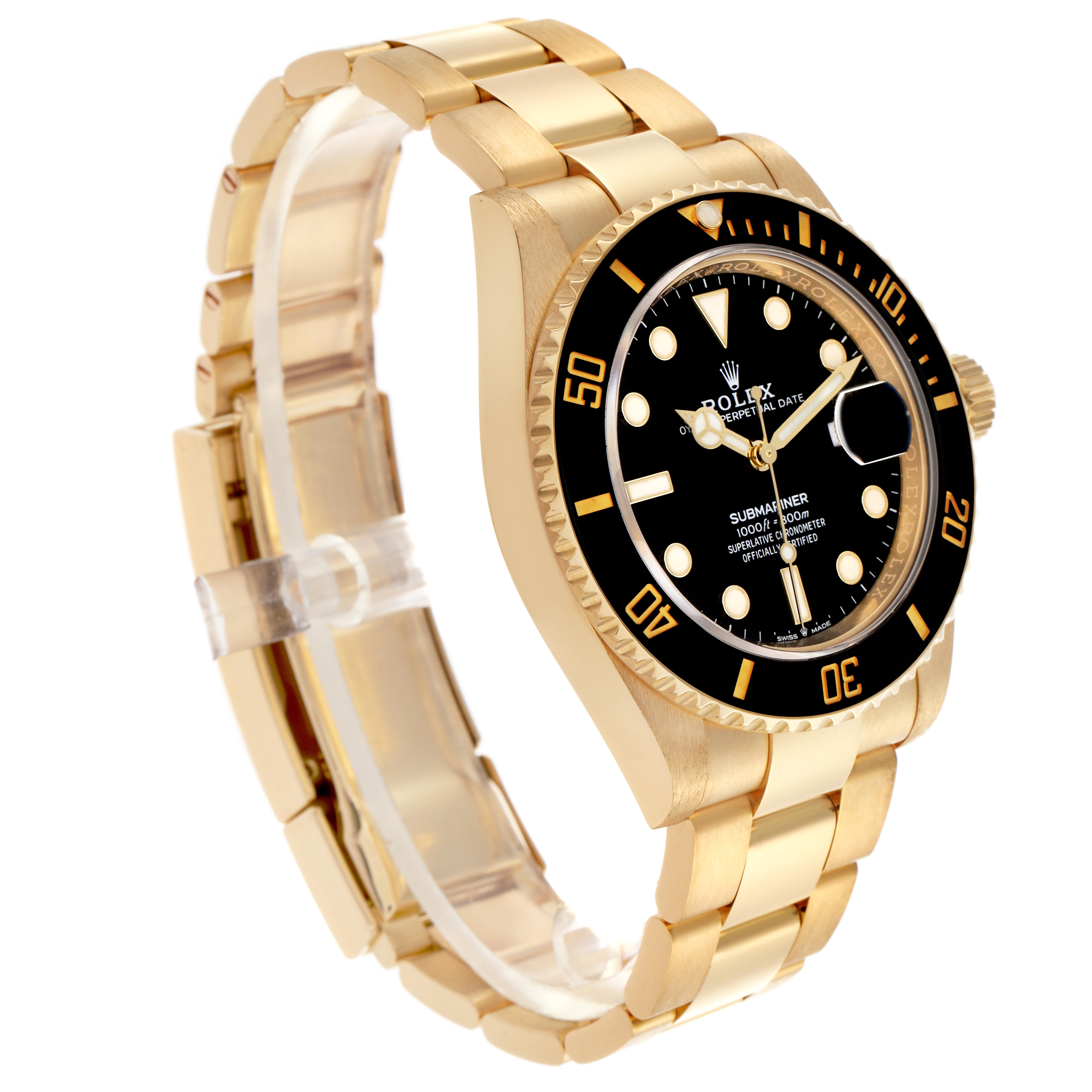 The Rolex Submariner 126618 Men's Yellow Gold Black Dial watch is shown at a three-quarter angle, highlighting the black dial, bezel, and gold bracelet.